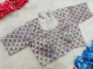 Patterned fabric with geometric design on a light background